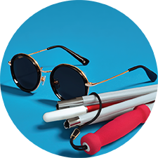 Sunglasses and collapsible cane.